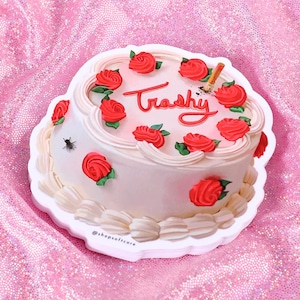 Trashy John Waters retro cake sticker.