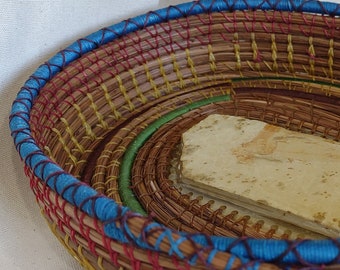 Med/large colorful pine needle basket with fossil base