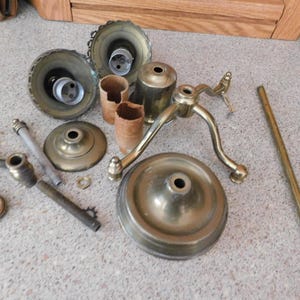 May include: A rustic wooden sign with the text "Welcome to our home" in white lettering. The sign features a distressed finish and a simple, inviting design, perfect for entryway decor.