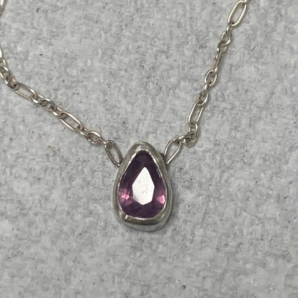 Sapphire Beautiful Purple-Pink. 1.24 carats set in a handmade, sterling silver necklace. 18 inches. Totally unique. Pear shape.