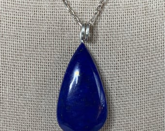 18 carat natural and untreated Lapis Lazuli. This is pear shaped in a handmade, sterling silver setting. Deep mesmerizing blue.