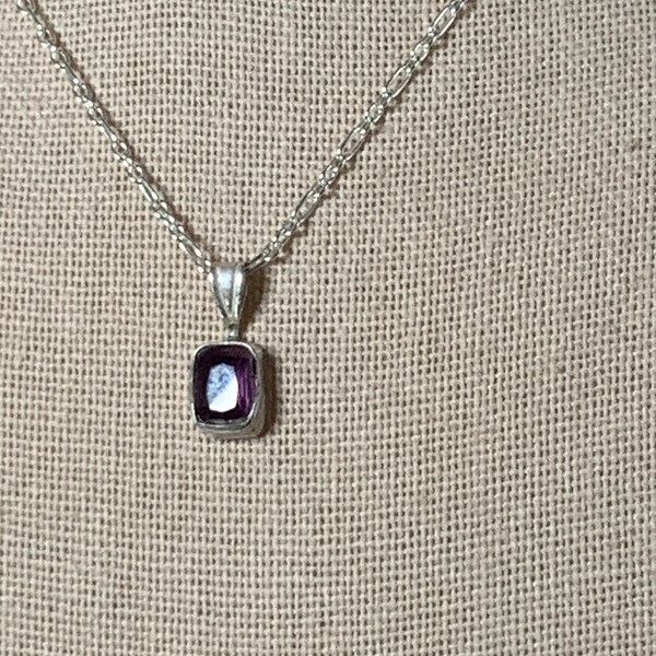 Purple sapphire pendant, emerald cut. 1.08 carats set in a handmade, sterling silver, setting.