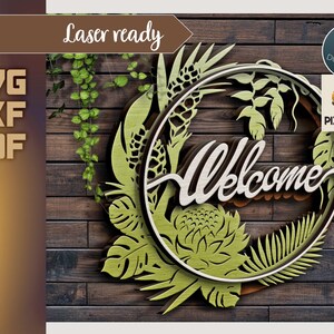 May include: Laser cut welcome sign with a green tropical leaf design. The sign is made of wood and has a circular shape. The word "welcome" is written in a decorative font.