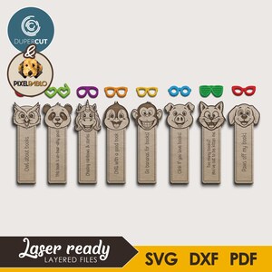 May include: Wooden bookmarks with animal faces and quotes. Includes an owl, panda, unicorn, monkey, pig, cat, and dog. Each bookmark has a different quote, such as "Owl about books" and "Paws off my book!"