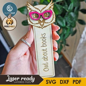 May include: A wooden bookmark featuring an owl design with pink glasses. The bookmark reads "Owl about books" and is laser-ready. The design includes layered files in SVG, DXF, and PDF formats.