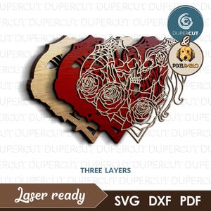 Pode incluir: Design de corte a laser de tr&ecirc;s camadas de uma caveira e rosas em forma de cora&ccedil;&atilde;o. O design &eacute; em vermelho e branco e est&aacute; pronto para ser cortado com um cortador a laser. O texto "Laser ready" e "SVG DXF PDF" tamb&eacute;m est&aacute; inclu&iacute;do na imagem.