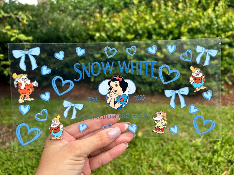 May include: A handmade wooden sign with the text "Welcome" in a handwritten style. The sign is painted white with a distressed finish and features a small, decorative heart. It is designed for indoor or outdoor use.