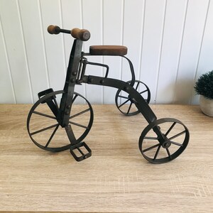 Antique top metal tricycle