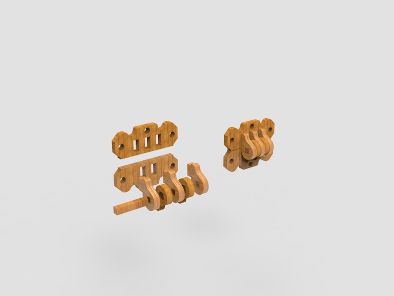 May include: A disassembled wooden toy with a light brown finish. The toy consists of several interlocking pieces, including a crank, gears, and mounting plates. The pieces are arranged to show how they fit together. The toy appears to be a mechanical puzzle or educational item.