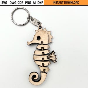 Lasergesneden flexibele zeepaardje sleutelhanger ontwerp SVG, lasergesneden flexibele sleutelhouder, beweegbare houten figuur, lasergesneden fidget houten mechanisch speelgoed