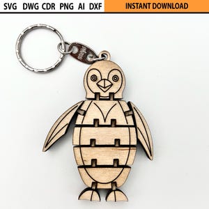 Llavero de pingüino flexible cortado con láser (diseño SVG), llavero flexible cortado con láser, figura de madera móvil, juguete mecánico de madera cortado con láser.