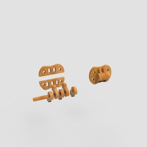May include: Wooden toy parts, including a circular piece with hinges, a rectangular piece with holes, and several other components. The pieces are light brown and appear to be unassembled, suggesting a construction or building toy.