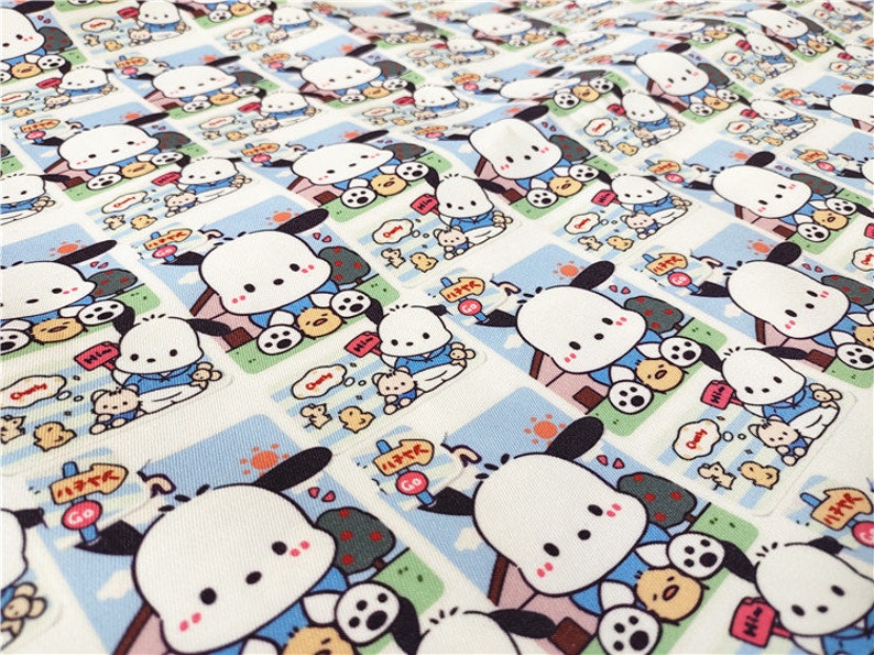 May include: White fabric with a repeating pattern of a cartoon dog wearing a blue shirt and holding a soccer ball. The dog is standing in front of a pink doghouse with a white roof. The fabric has a white background with a light blue border around each dog.