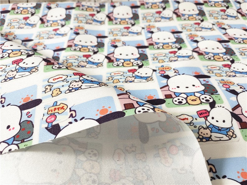 May include: White fabric with a repeating pattern of a cartoon dog wearing a blue shirt and holding a ball. The dog is surrounded by other cartoon characters, including a small yellow chick. The fabric has a blue and white striped border.