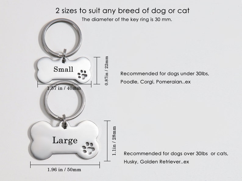 May include: Two silver bone-shaped dog tags with key rings. The smaller tag is labeled "Small" and measures 1.57 inches by 0.87 inches. The larger tag is labeled "Large" and measures 1.96 inches by 1.1 inches. The tags are recommended for dogs under and over 30 pounds, respectively.