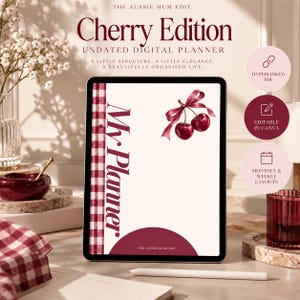 May include: A digital tablet displaying a planner cover titled My Planner with a red and white gingham side border and a cherry illustration with a ribbon. The screen includes text reading The Aussie Mum Edit and Cherry Edition.