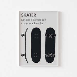 May include: A framed print featuring three black skateboard illustrations against a light gray background. The text at the top reads "SKATER" followed by the phrase "just like a normal guy, except much cooler."