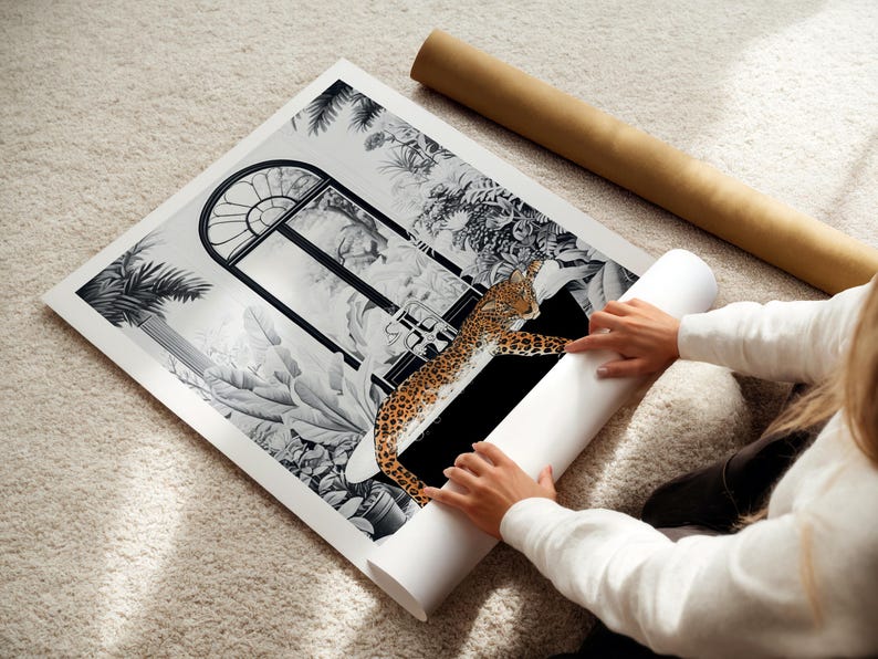 May include: A square art print featuring a black and white illustration of a large arched window surrounded by lush tropical foliage and palm leaves. A realistic, colored leopard is depicted lying across the bottom section of the window frame.