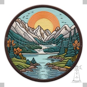 May include: Embroidered patch featuring a scenic landscape with mountains, a river, and a setting sun. The mountains are white and gray, the river is blue, and the sun is orange and yellow. The patch is circular and has a brown border.