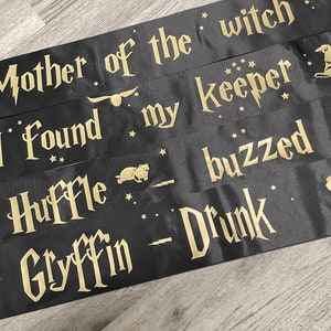 Hen party sashes | wizard font | black with gold font