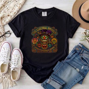 Black t-shirt with The Electric Mayhem band logo, 1974 concert design.