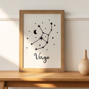 Puede incluir: Una impresi&oacute;n enmarcada con una ilustraci&oacute;n en blanco y negro de la constelaci&oacute;n de Virgo con la palabra "Virgo" escrita debajo.