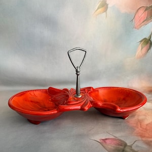 May include: A set of three ceramic mugs with a speckled, matte finish. The mugs are in shades of cream, light gray, and dark gray. Each mug has a simple, minimalist design, perfect for coffee or tea.