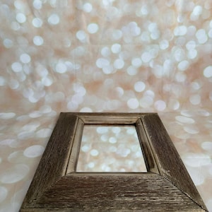 May include: A set of three ceramic mugs with a speckled, matte finish. Each mug features a different color: light blue, cream, and gray. The mugs have a simple, modern design and a comfortable handle.