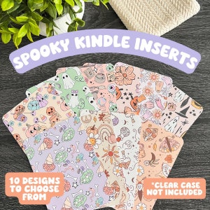 May include: Ten different designs of spooky themed printable inserts for a Kindle e-reader. The designs feature various Halloween icons like ghosts, pumpkins, and potion bottles. The text "Spooky Kindle Inserts" and "10 Designs to Choose From" is visible in the image.  *Clear Case Not Included* is also visible in the image.