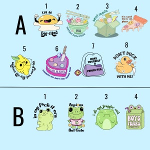 May include: A set of 16 colorful stickers featuring various illustrations and text. The stickers are arranged in two rows of eight, labeled A and B. Some of the illustrations include a fried egg, a bowl of noodles, a pizza slice, a lemon, a cake, a tea bag, a rubber duck, and a frog.
