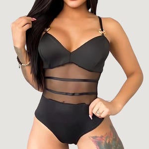 Sheer Mesh Bodysuit with Sensual See-Through Design and Metallic Details.