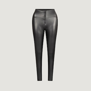 Shiny High-Waisted Black Faux Leather Leggings: Style, Support, and Elegance.