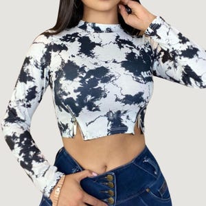 Cropped Long Sleeve with Side Zippers & Abstract Ribbed Design.
