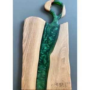 Handcrafted Walnut Wood and Green Epoxy Resin Live Edge Charcuterie Serving Board - A stunning fusion of artistry and functionality. Locally sourced walnut wood with live edge and vibrant green epoxy resin. Food-safe finish for worry-free indulgence.