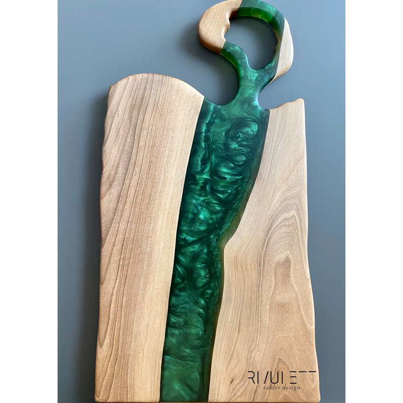 Handcrafted Walnut Wood and Green Epoxy Resin Live Edge Charcuterie Serving Board - A stunning fusion of artistry and functionality. Locally sourced walnut wood with live edge and vibrant green epoxy resin. Food-safe finish for worry-free indulgence.