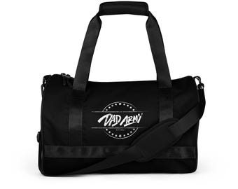 May include: Black duffel bag with a white logo that says "DAD ARMY" in a circle with stars around it.