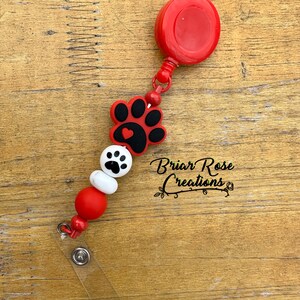 Odznaka Red Paw w rolce