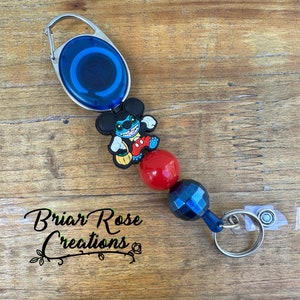 Alien Mouse Badge Reel