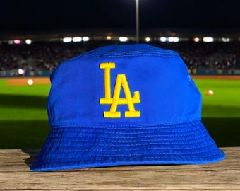 Blue LA Bucket Hat with Yellow Thread Logo – Stylish and Eye-Catching Cap