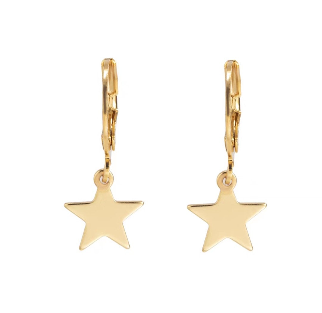 The new golden five-pointed star titanium steel earrings niche cold wind personality earrings