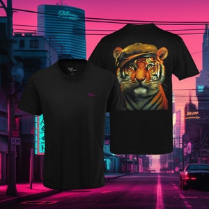 Embrace Feline Charm: Discover our Whiskered Wonder Tee, a Playful Expression of Tiger Cuteness and Fashionable Flair!