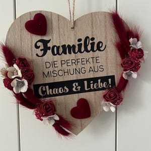 Wooden heart with the word family, spring heart, decorative heart, flower heart, dried flowers and artificial, heart, permanent heart.