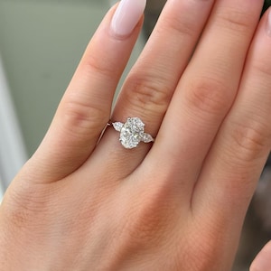 3 Carat Oval Lab Grown Diamond Engagement Ring: Pear Side Stones