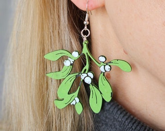 Christmas earrings in the shape of mistletoe.