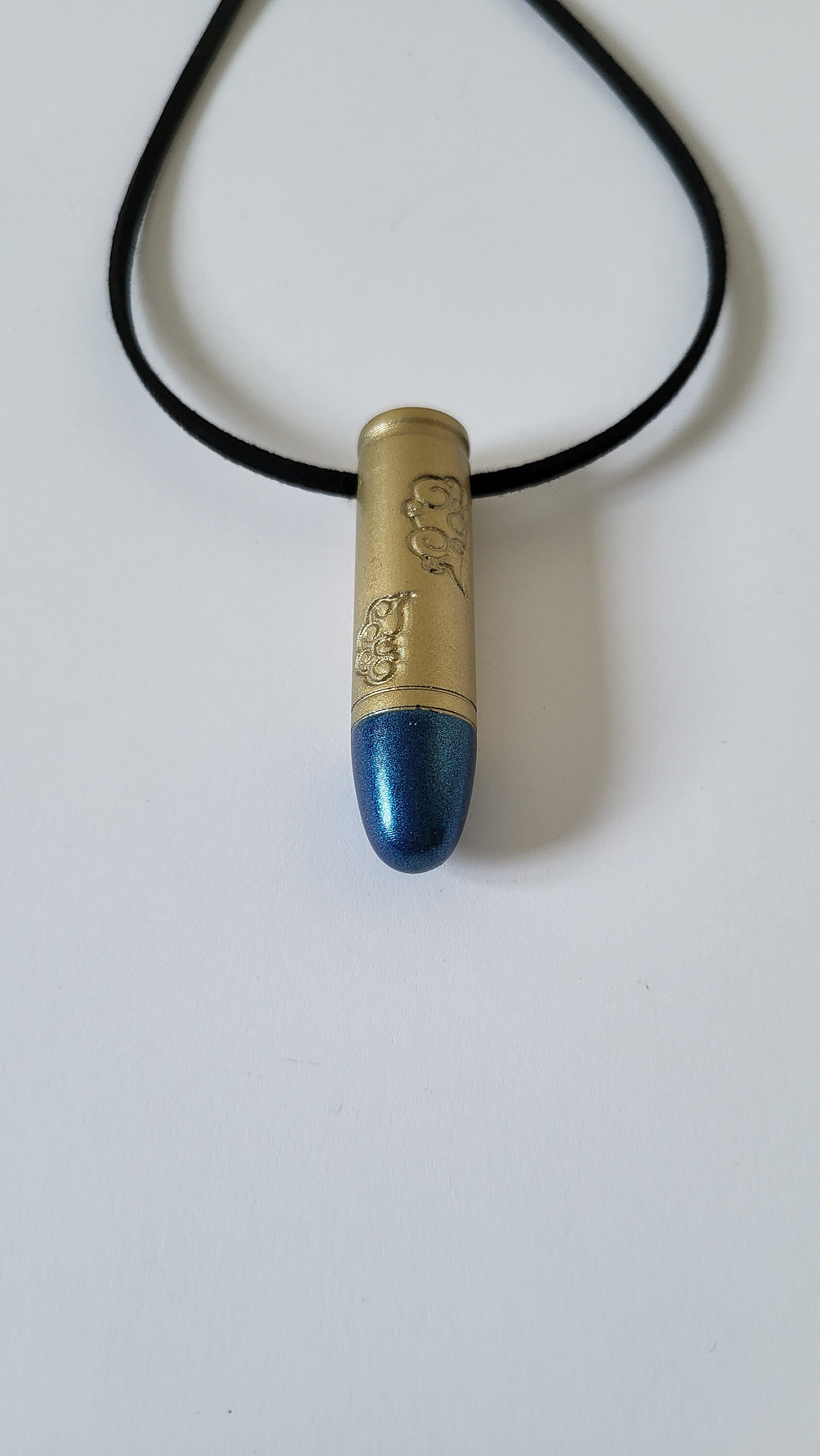 Jinx bullet pendant (based on the League of Legends character Arcane).