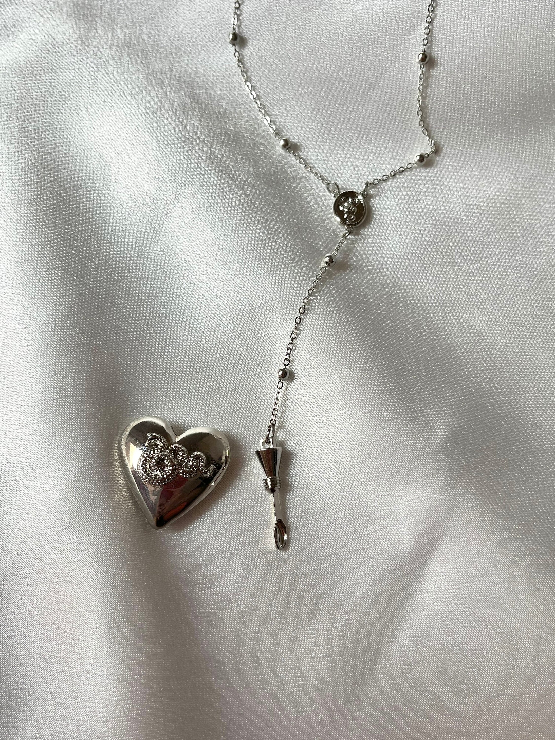 Look what came in the mail today. The original/authentic LDR Coke Necklace.  : r/lanadelrey
