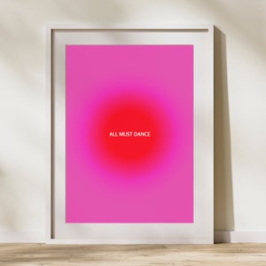 Può includere: Un poster incorniciato con un gradiente rosa e rosso con il testo "ALL MUST DANCE" in bianco.