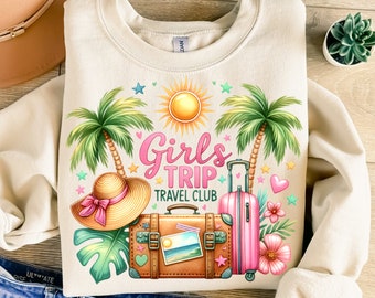 Może przedstawiać: Beżowa bluza z nadrukiem graficznym przedstawiającym palmy, walizkę, słońce, kapelusz i tekst "Girls Trip Travel Club".