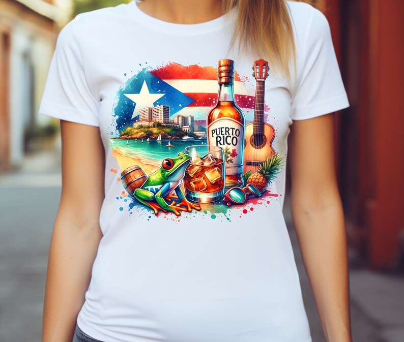 May include: White t-shirt with a colourful watercolour design featuring a Puerto Rican flag, a bottle of rum labelled "Puerto Rico", a glass of rum with ice, a guitar, a pineapple, and a green tree frog.