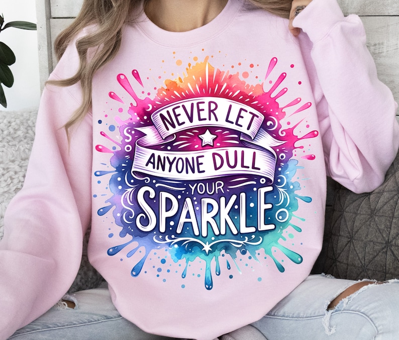 May include: Pink sweatshirt with a watercolour design featuring the text "Never let anyone dull your sparkle".